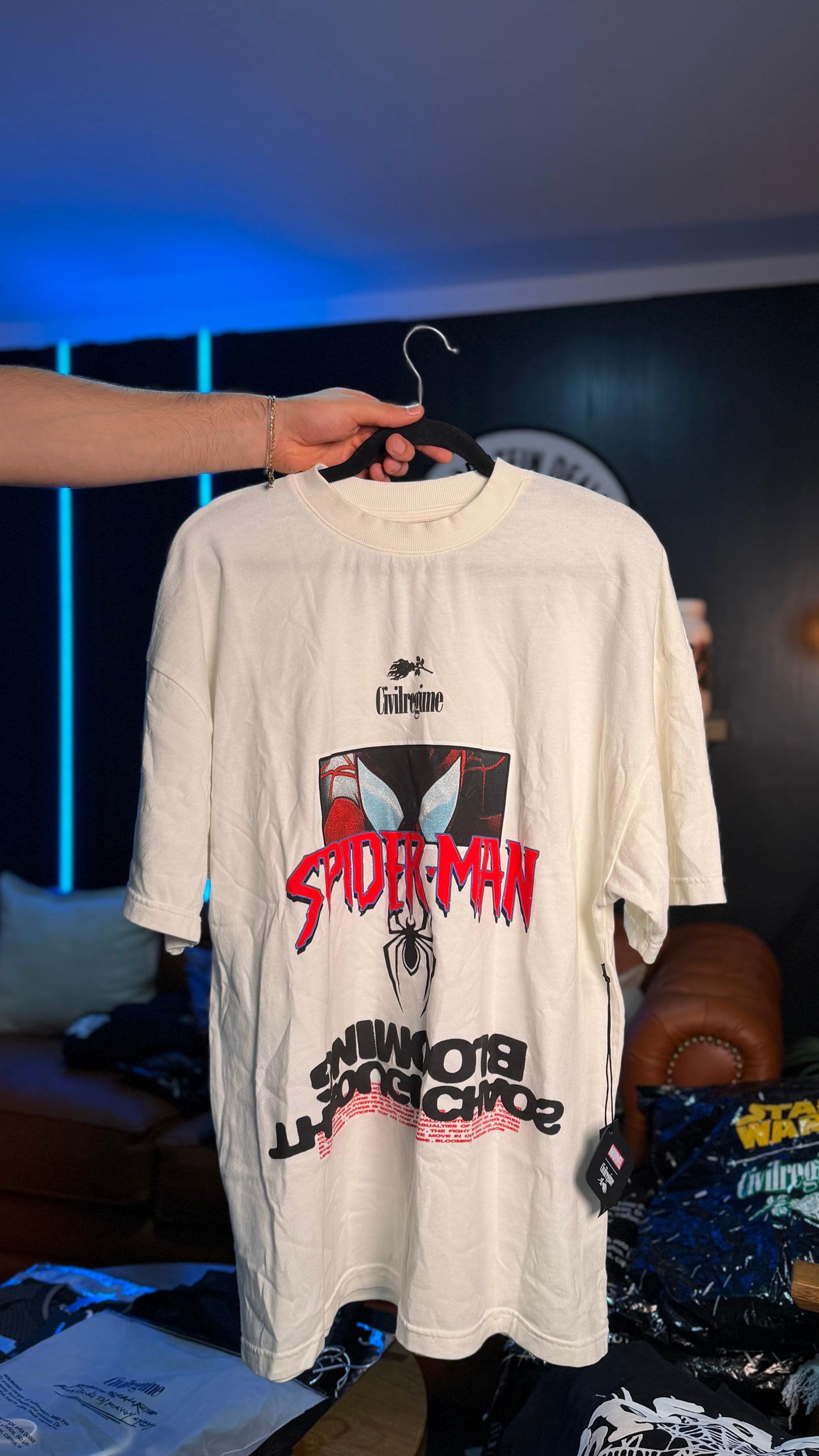 SPIDERMAN SWINGING THROUGH CHAOS OVER T-SHIRT