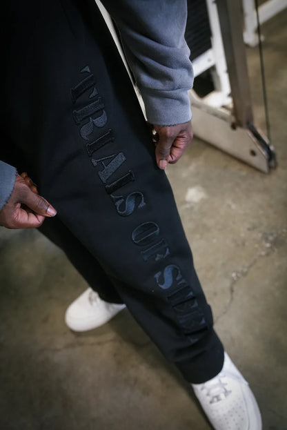 TRIALS OF STEEL SWEATPANTS
